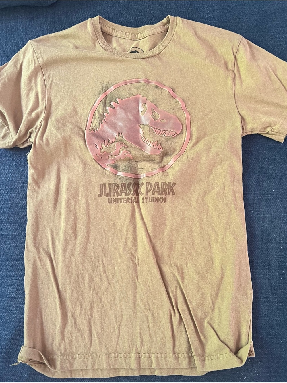 Universal Brown Tee with dark brown Jurassic Dinosaur Emblem